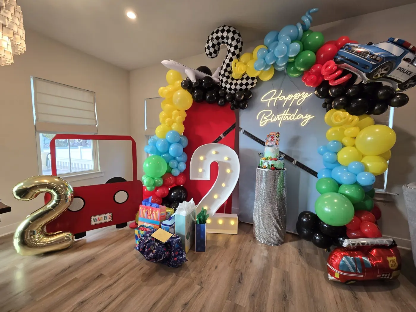 Red, black and white balloon arch with race cars and a number 2 for a second birthday, by Balloon Events by Gigi, Rochester NY